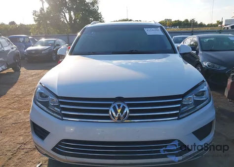 2015 Volkswagen Touareg V6 Lux from USA, damaged, VIN WVGEF9BP0FD002900